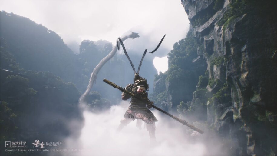 Screenshot of Black Myth: Wukong. Monkey King overlooking a lush ravine, a long white dragon flies through the clouds in the background.