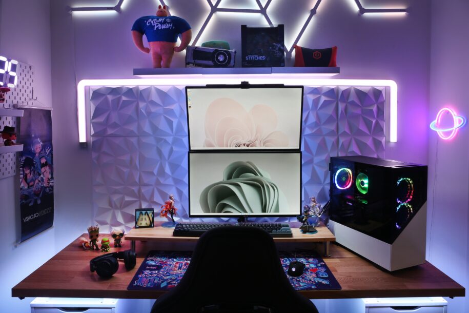 Computer setup with two monitors stacked vertically.